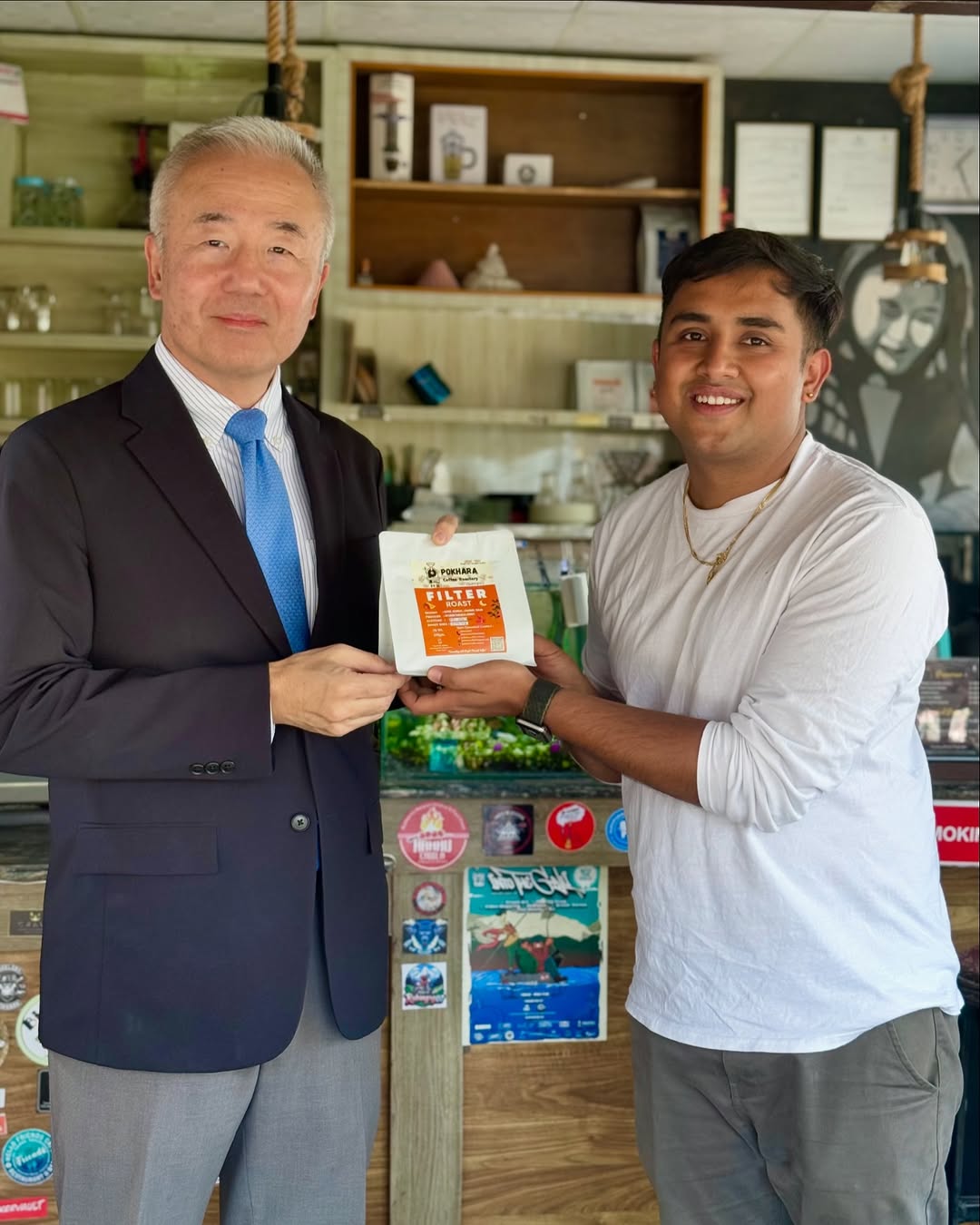 Suraj Thapa with Japanese Ambassador Mr. MAEDA Toru at a coffee appreciation event